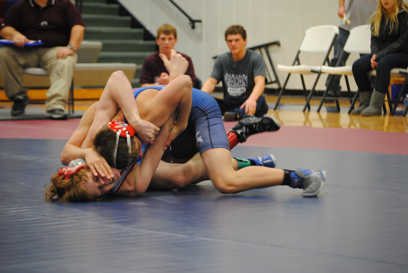 Wrestling team continues season, competing, improving every day