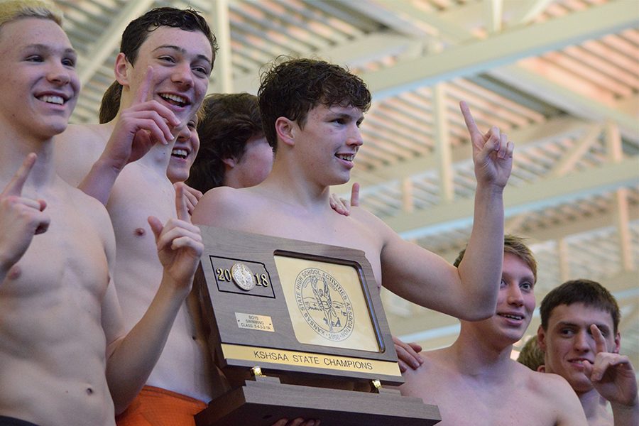Seaman boys swim team celebrates after winning state