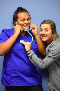 Senior Megan Skoch and Sophomore JahnAsia Anderson show off their future nursing careers. Skoch and Anderson dressed up for the spirit day When I Grow Up.
