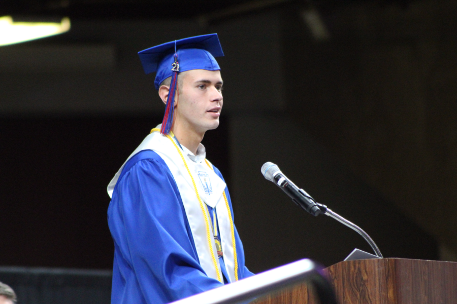 Senior Kaden Fox speaks at graduation, highlighting the ups and downs of the Class of 2021s high school experience. Fox is known as a remarkable and successful student who was committed to FCCLA.