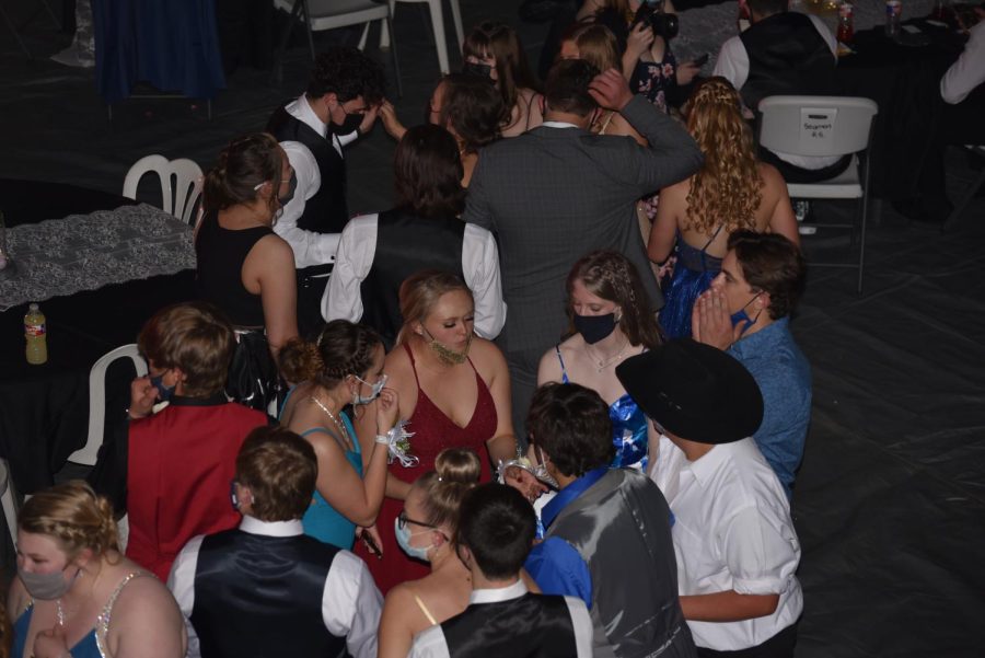 After prom was limited to only seniors and their dates, moving from the EXPO center to Seaman High Schools gymnasium, students continued to mingle and have a fun time at prom. Students were required to wear masks to prom.