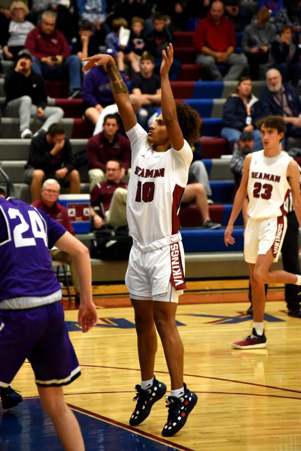 Senior Mateo Hyman shoots a free throw at the December 7, 2021, game against Topeka West.